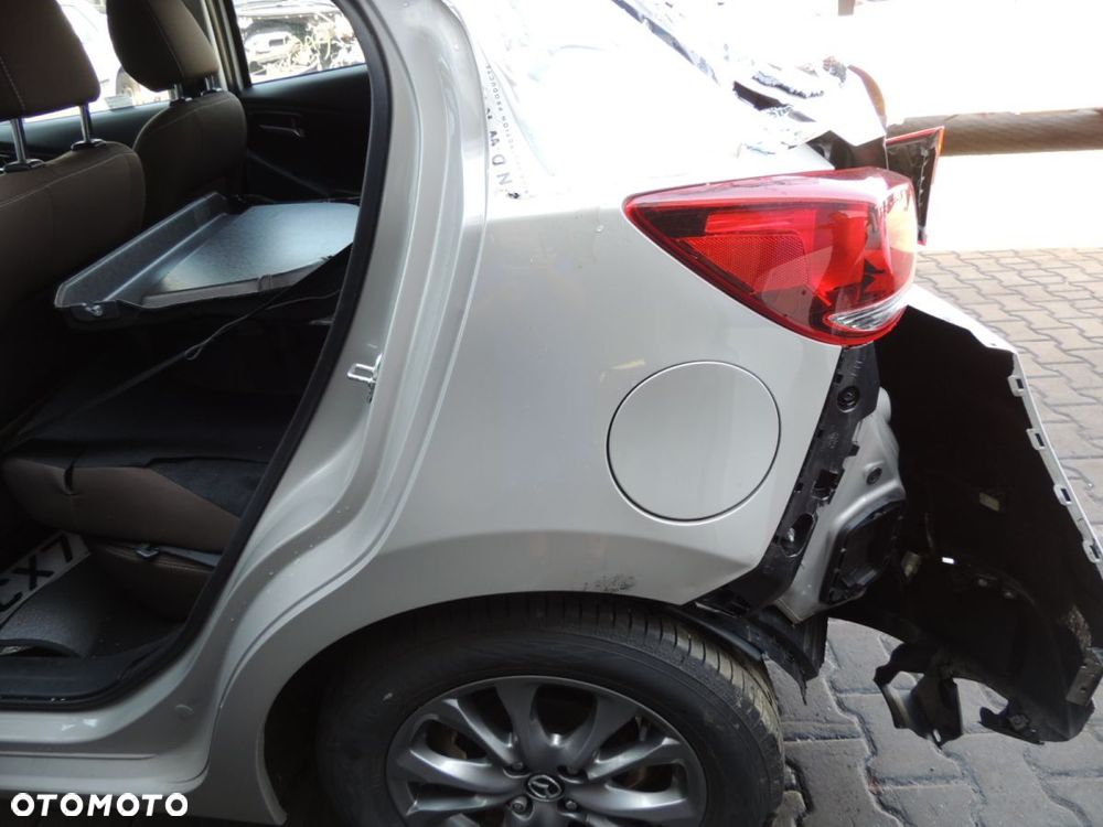Błotnik lewy tył MAZDA 2 III DJ lift '22 - 1