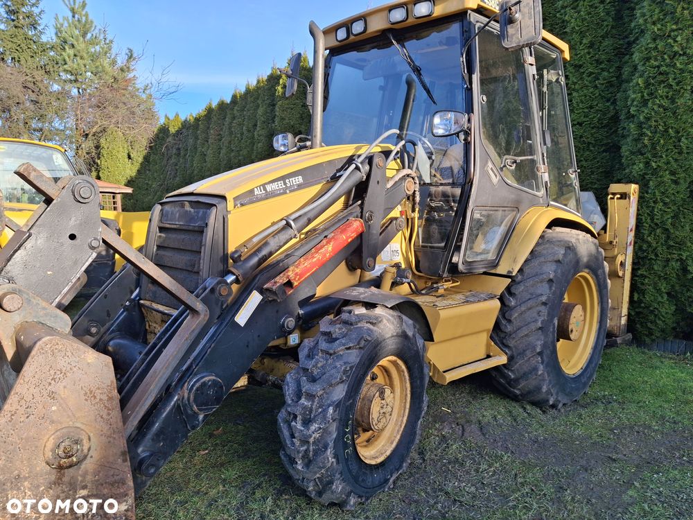 Caterpillar CAT 438D ALL WHEEL STEER - 1