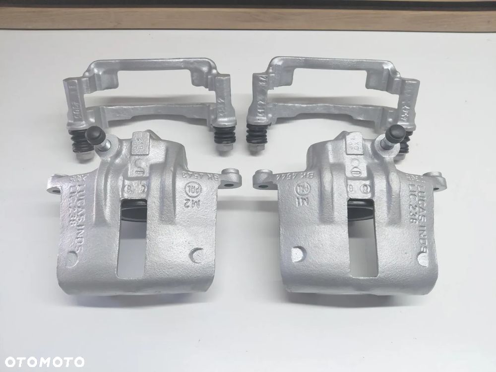 zacisk skoda favorit felicia I  II  przód lewy prawy oryginał - 2