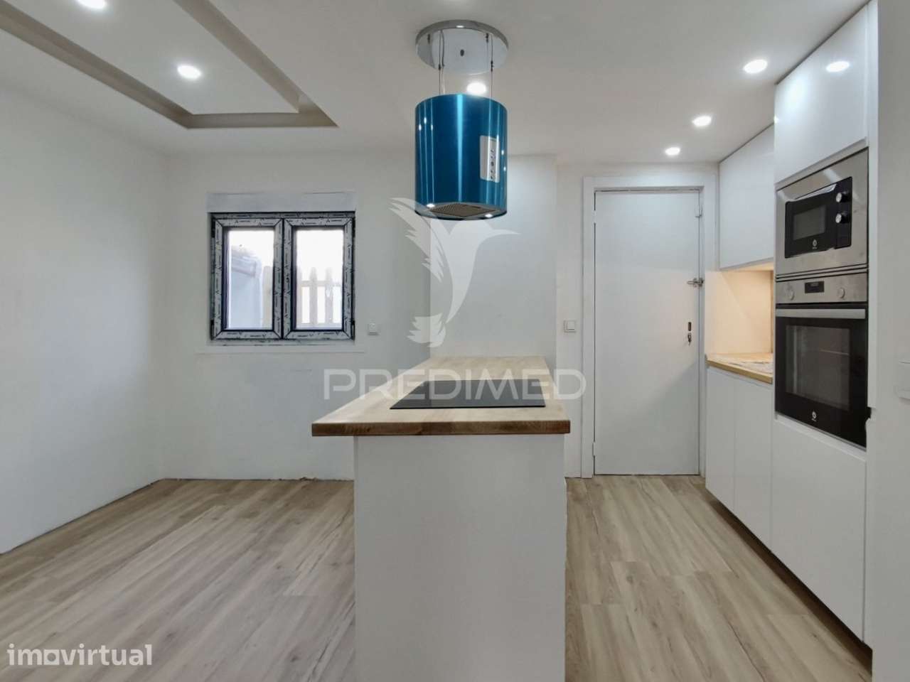 Moradia T2+1 com quintal totalmente remodelada em Almada - Grande imagem: 5/37