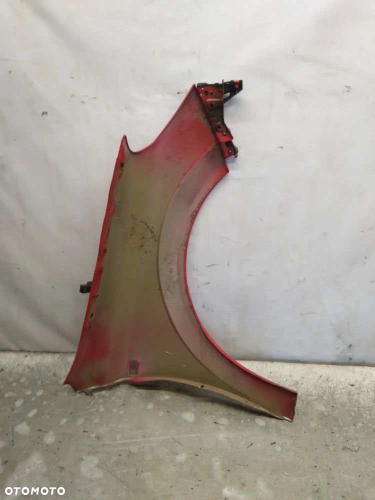 OPEL ASTRA III H BŁOTNIK PRZÓD PRZEDNI LEWY Y547 CZERWONY - 4