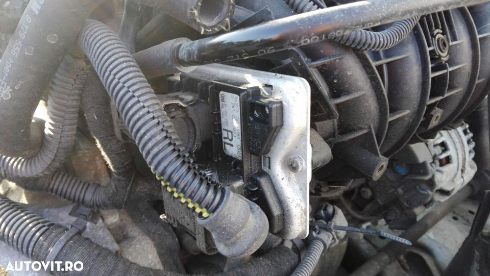 Calculator motor Opel Astra G 1.2 benzina din 2009  COD 0 261 204 093 - 1