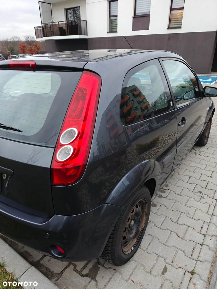 Ford Fiesta 1.4 Ghia - 12