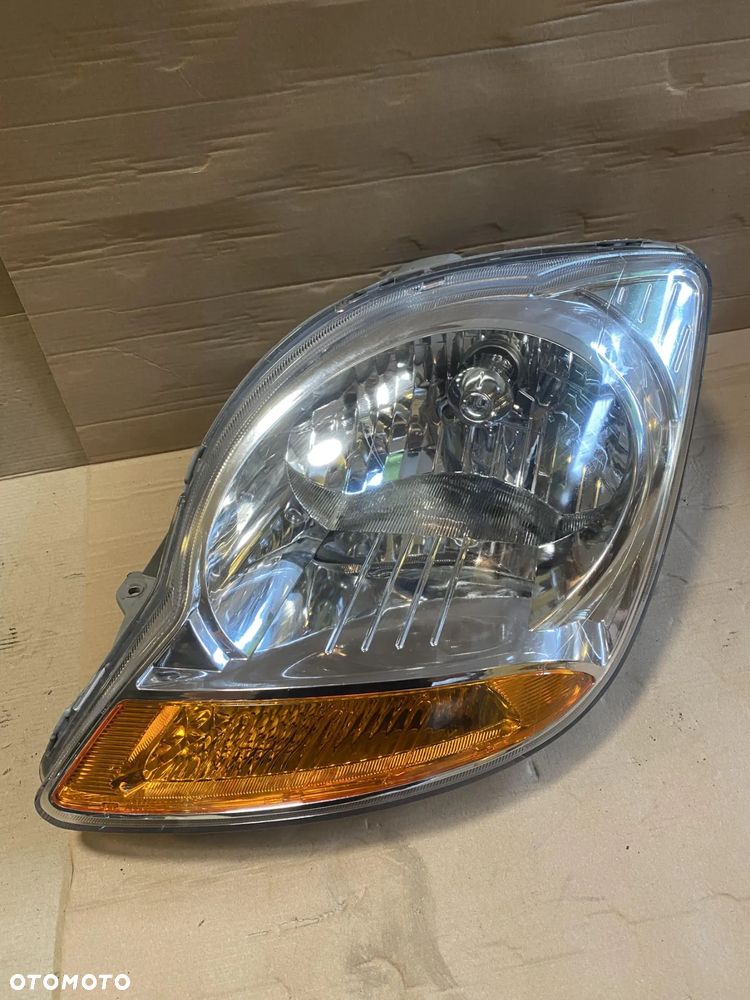 Lampa Chevrolet Spark II lewa