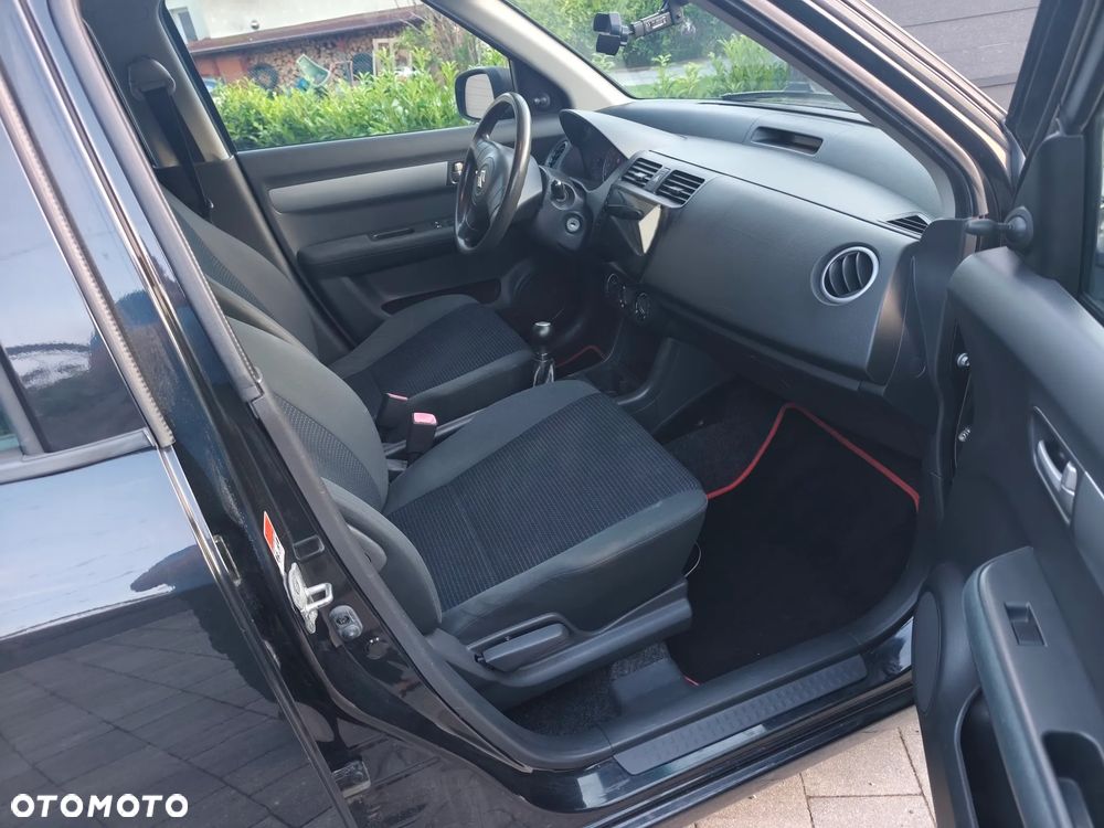 Suzuki Swift 1.3 Club - 8