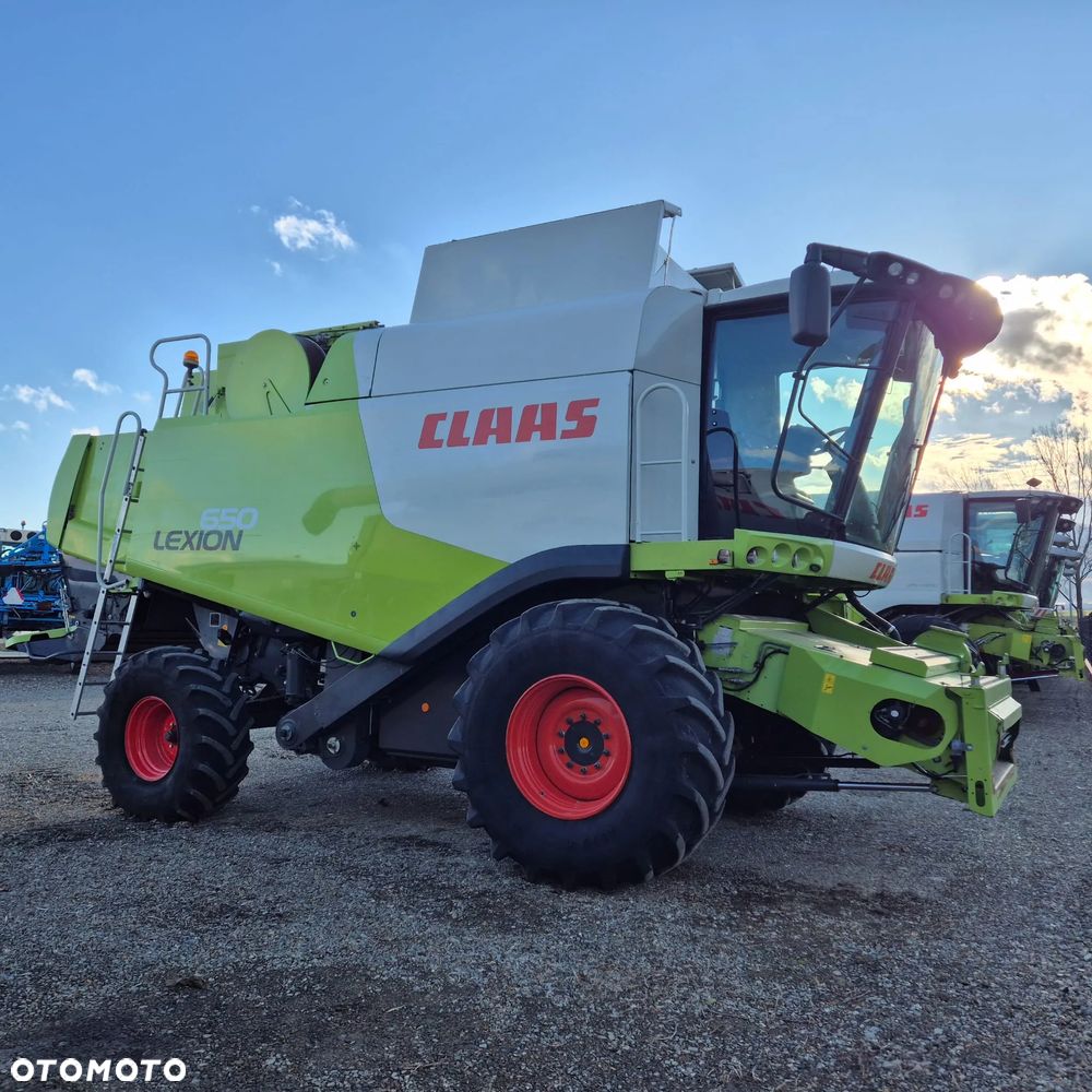 Claas Lexion 650 z hederem - 2