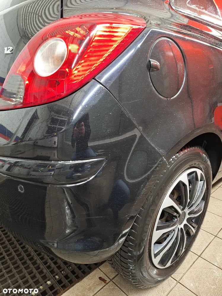 Opel Corsa 1.2 16V Cosmo - 5