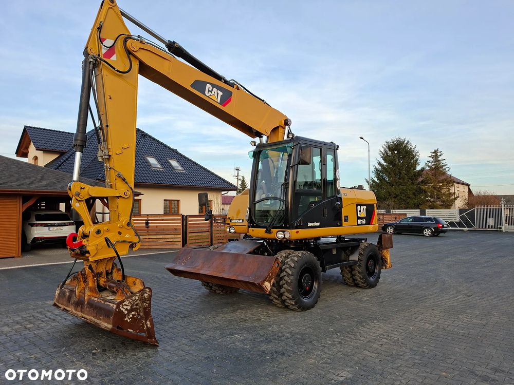Caterpillar CAT M315D Rok 2011 - 9