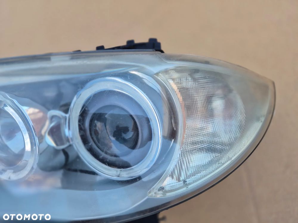 BMW 1 E87 reflektor lewy.Ksenon.Valeo.EU. - 4