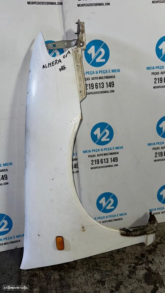 Guarda Lamas esquerdo Nissan Almera 1998 - 1