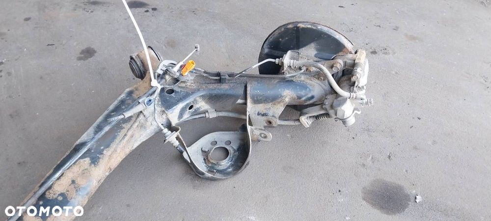 BELKA OŚ ZAWIESZENIA TYŁ TARCZE Z ABS HONDA JAZZ II LIFT - 2