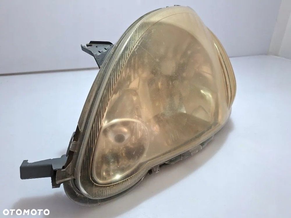 TOYOTA YARIS I LAMPA REFLEKTOR LEWY PRZÓD EUROPA 89008658 811700D080 - 6
