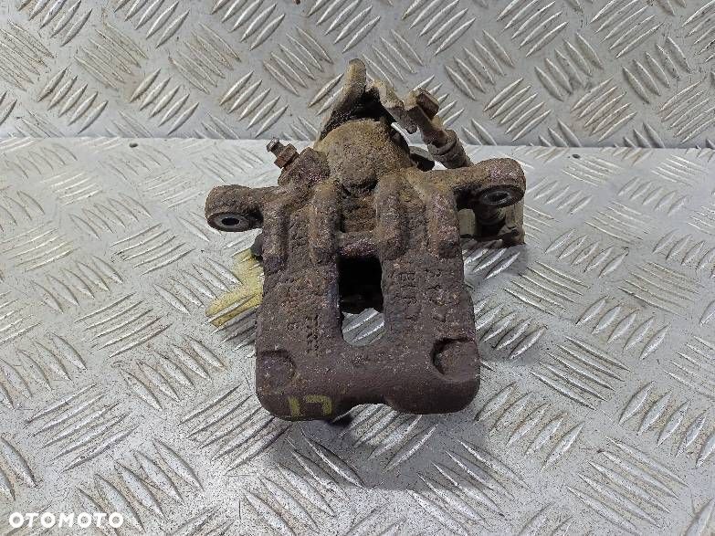 ZACISK LEWY TYLNY HONDA CIVIC - 1