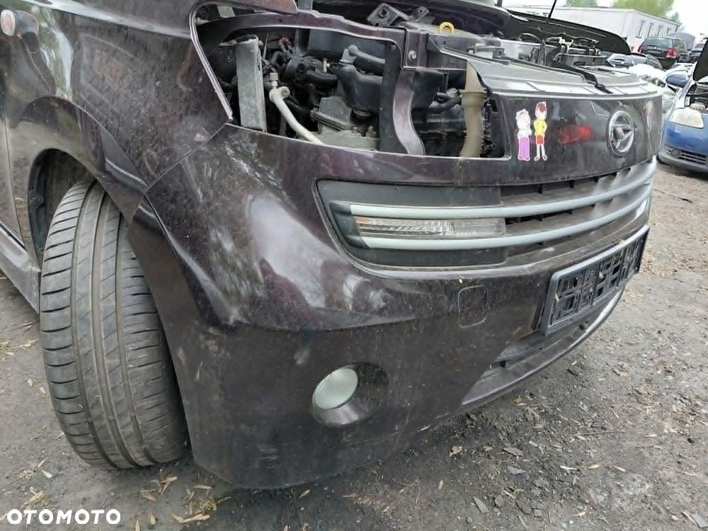 Zderzak przedni zderzak przód Daihatsu Materia Rok 2008 Pojemność 1298 Moc 67 kw Benzyna - 2