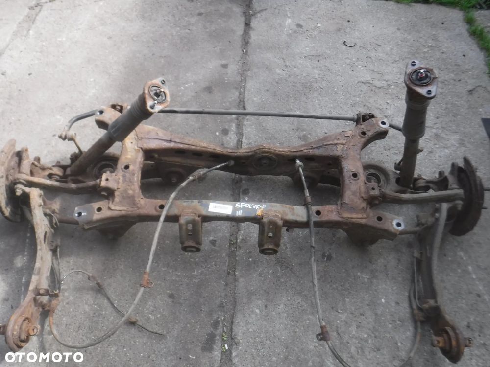 Kia Sportage III Hyundai IX35 4x4 4WD zawieszenie belka wozek os tyl zwrotnice kolyska 55405-2S110 - 1