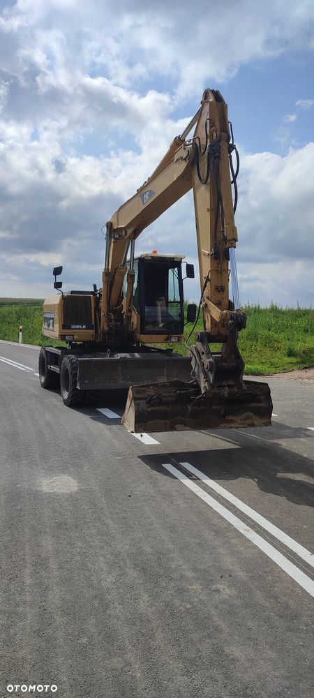 Caterpillar M315 - 4