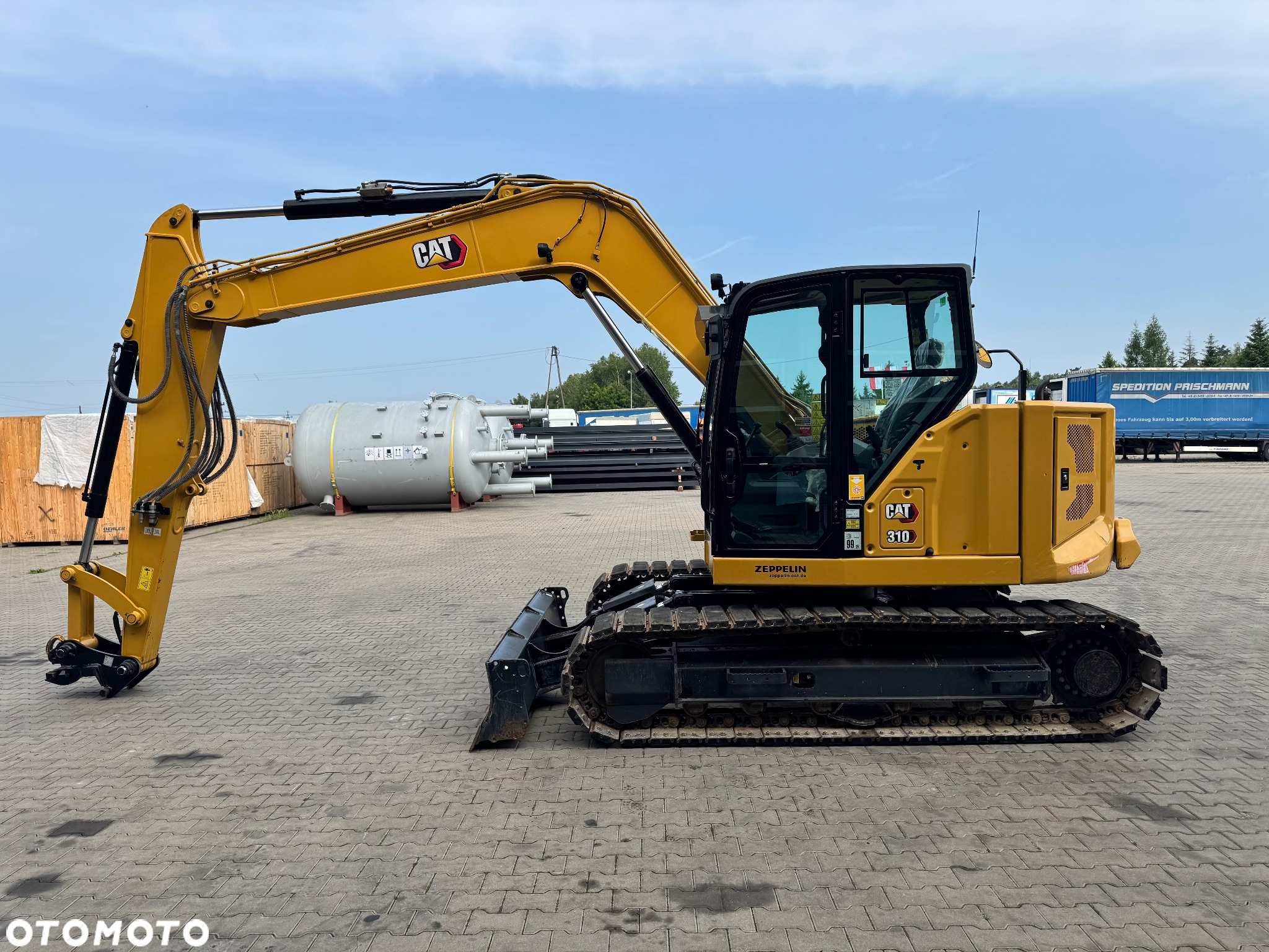 Caterpillar 310 - 6