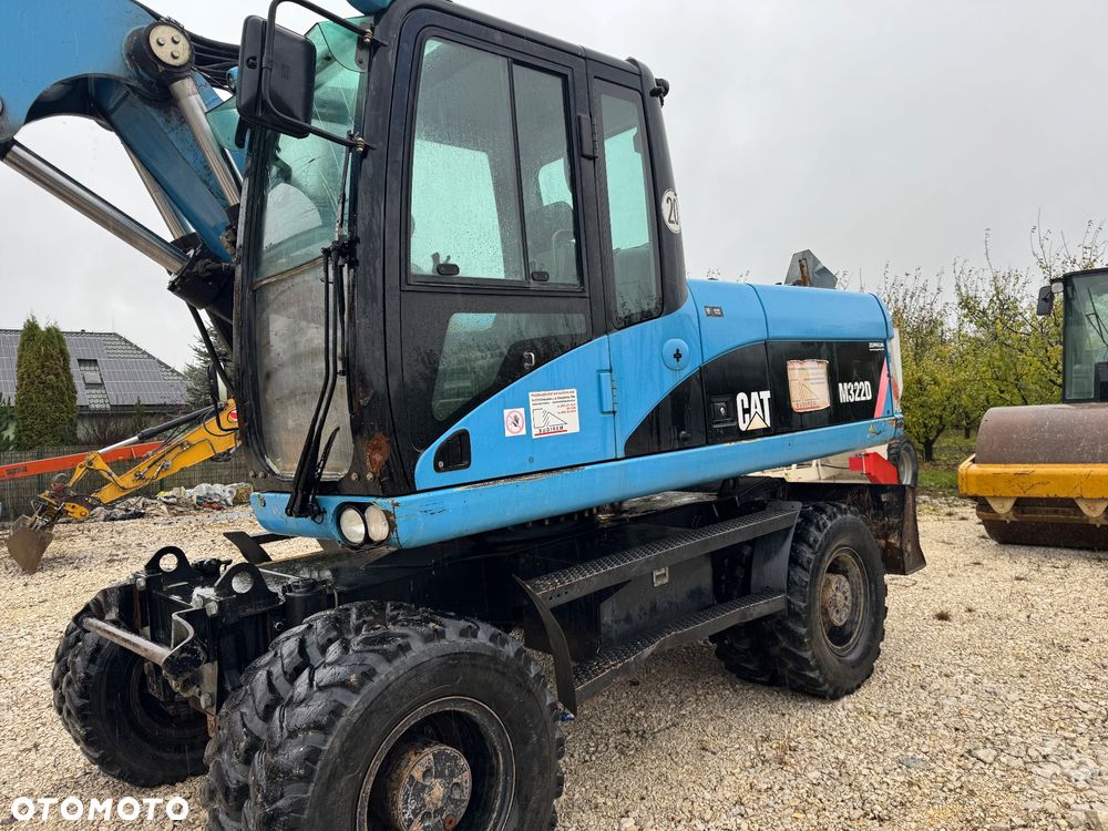 Caterpillar M322D - 3