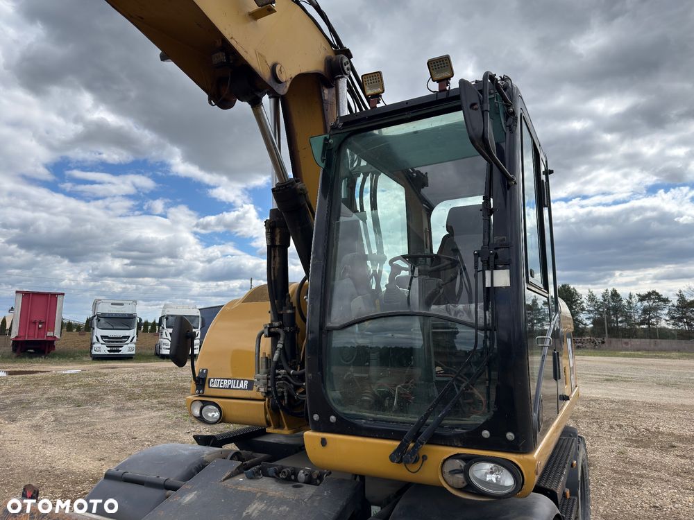 Caterpillar M 313 D - 12