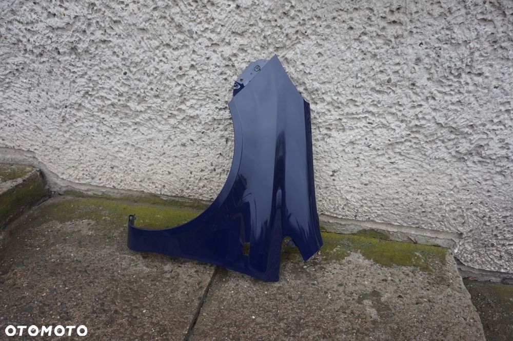 BŁOTNIK PRZEDNI LEWY OPEL CORSA D Y20Z - 2