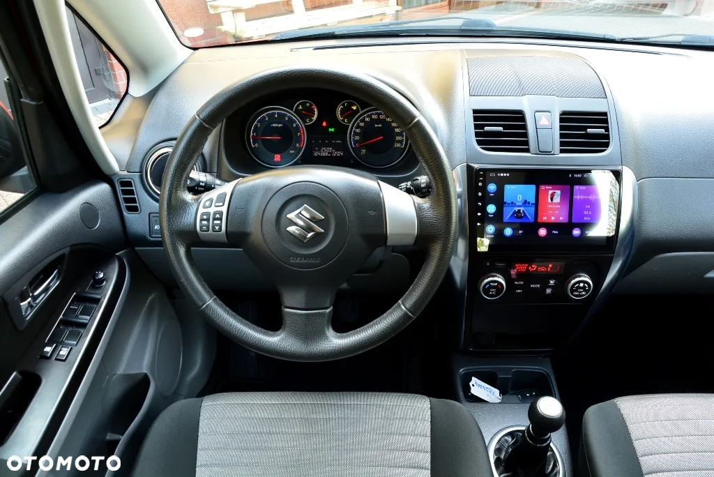 Suzuki SX4 1.6 Comfort Plus - 8