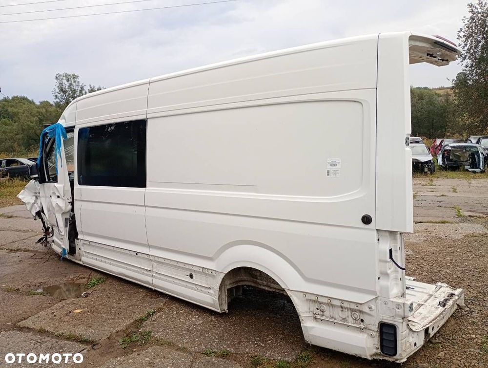 KAROSERIA ĆWIARTKA BŁOTNIK TYŁ LEWY  MAN TGE Autobus 2017 - 2022 2.0 TDI 130 kW [177 KM] olej - 1