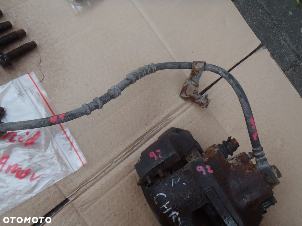 amortyzator sprężyna piasta zwrotnica zacisk jażmo chrysler voyager I II 92r - 24