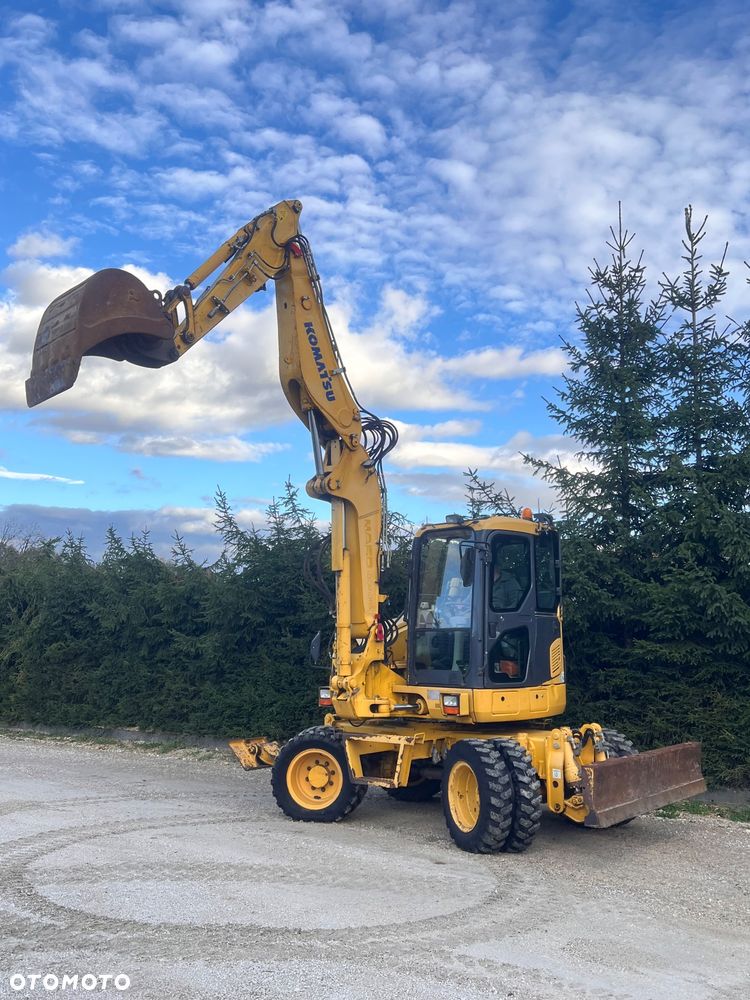 Komatsu Koparka kołowa KOMATSU 10ton PW98MR-8 4x4x4 plug podpory KLIMA 30km/h ramie Long 3xłamane skrętne 2012r bez DPF i ADBLUE 4cyl dodatk wyjścia hydr 51Kw 2osie skrętne pług stopy Cat TEREX Liebherr Wacker Pw 98 mr 8 11 prosto z importu - 4