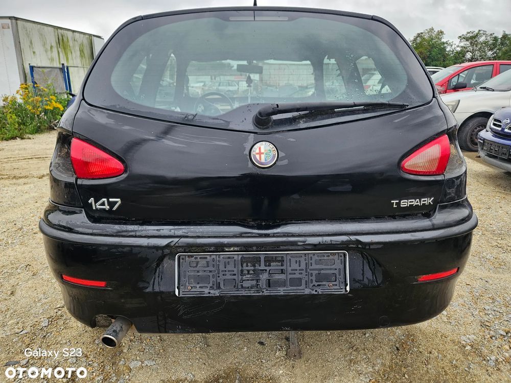 Zderzak tył tylny Alfa Romeo 147 2003r przedlift kod lakieru 601 Nero - 1
