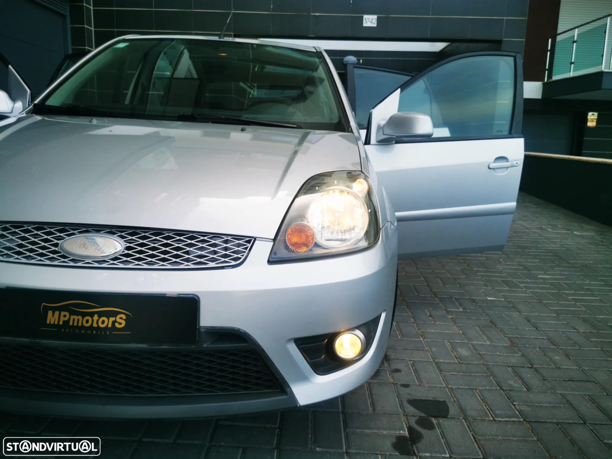 Ford Fiesta 1.25 Ghia - 9