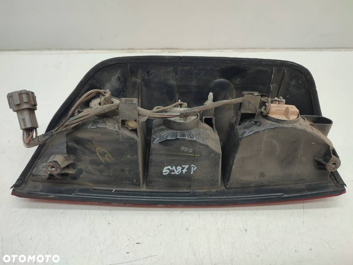 LAMPA TYL TYLNA PRAWA W BŁOTNIK NISSAN NAVARA III D40 EUROPA - 6