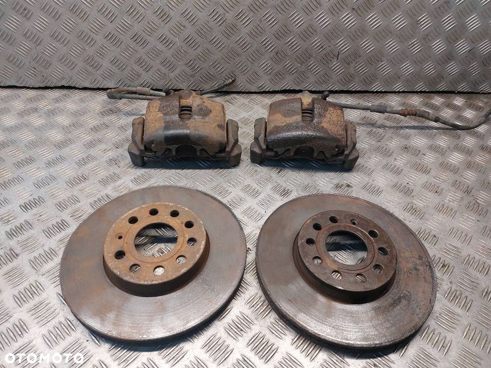 TARCZE HAMULCOWE PRZÓD + KLOCKI + ZACISKI VOLKSWAGEN TOURAN I 2.0 TDI - 1