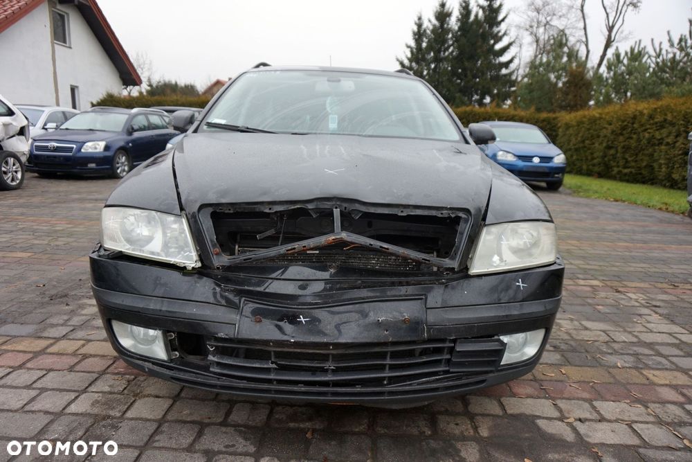SKODA OCTAVIA II LIFT KOMBI 2008 9910 2.0 TDI BMM 140KM KNS CZARNY na części - 8
