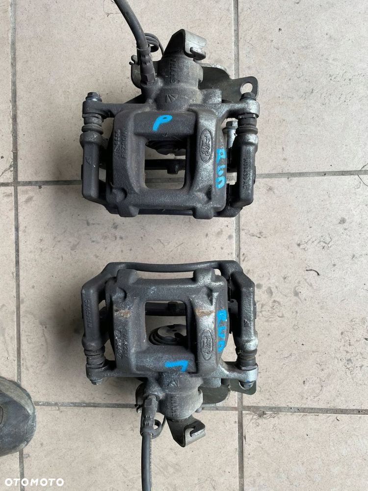 ZACISK HAMULCOWY TRANSIT MK8 16 TYŁ NAPĘD - 1