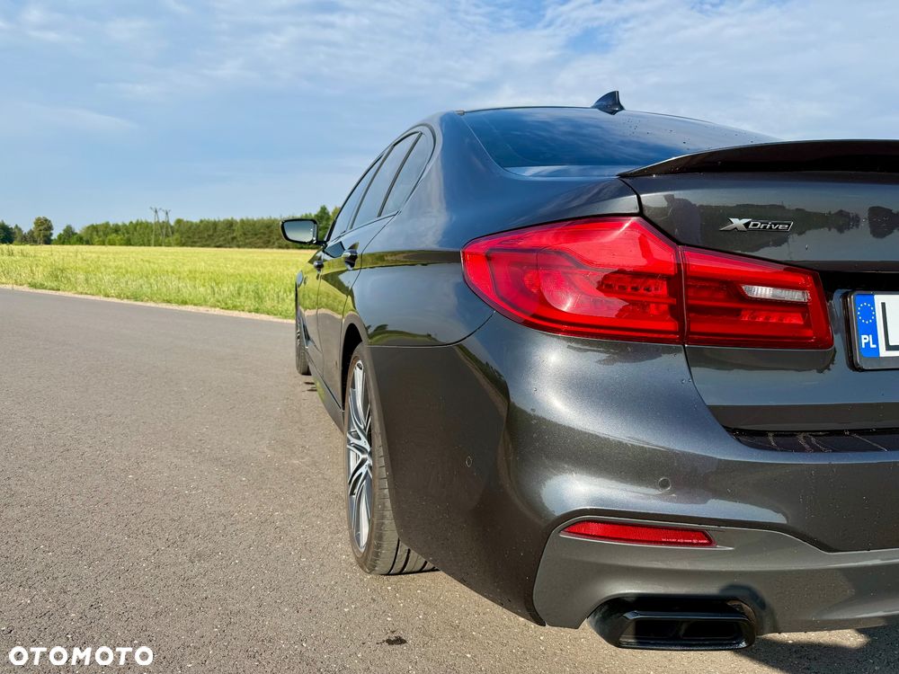 BMW Seria 5 M550i xDrive - 14