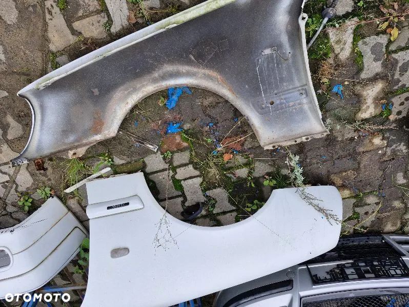 błotniki przód przednie  Mercedes E200 - 2