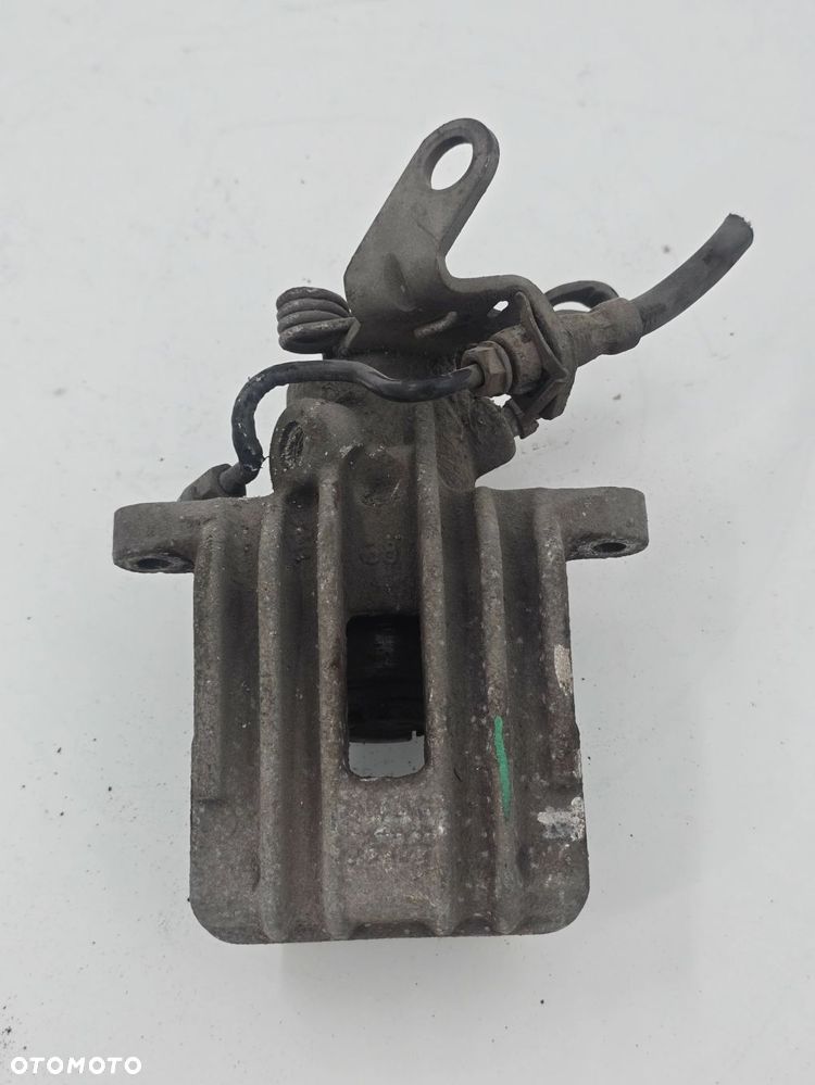 ORYGINALNY ZACISK HAMULCOWY LEWY TYŁ VW GOLF V 1K1 1K0615423 - 3