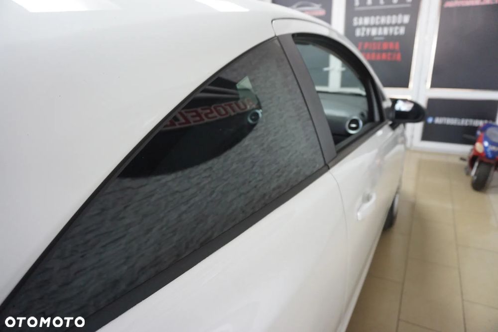 Opel Corsa 1.2 16V Cosmo - 19