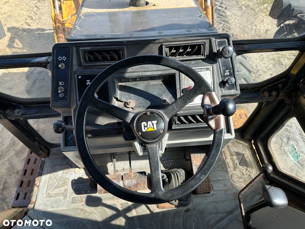 Caterpillar 428B ramię typu Banan - 7