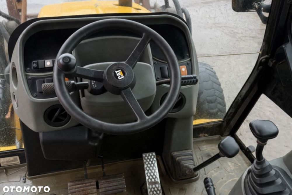 Caterpillar Caterpillar 428 D 4X4 - 7