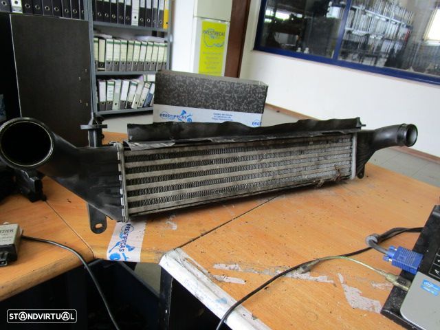 Radiador Intercooler A1705050630 MERCEDES W170 2002 230I USADO - 2
