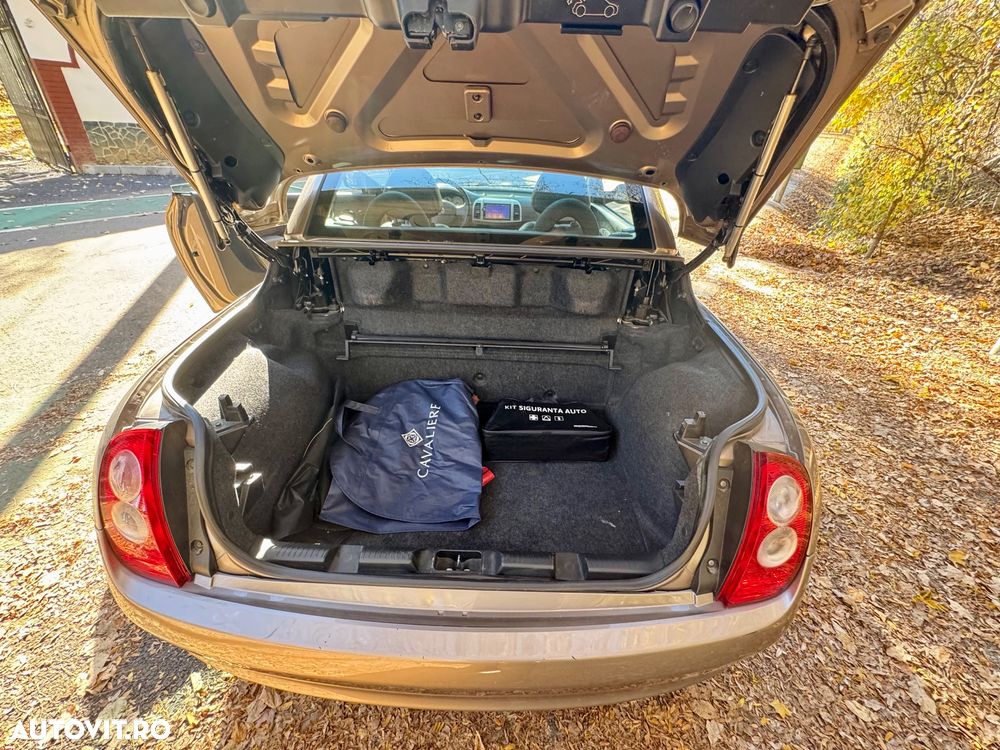 Nissan Micra 1.6 C+C Tekna + - 19