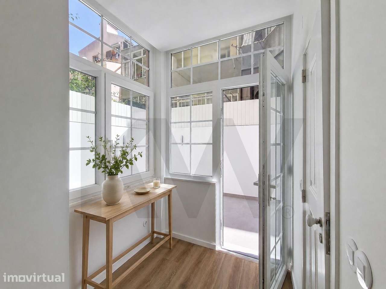 Apartamento T1 remodelado em Alcântara com logradouro privativo - Grande imagem: 5/26
