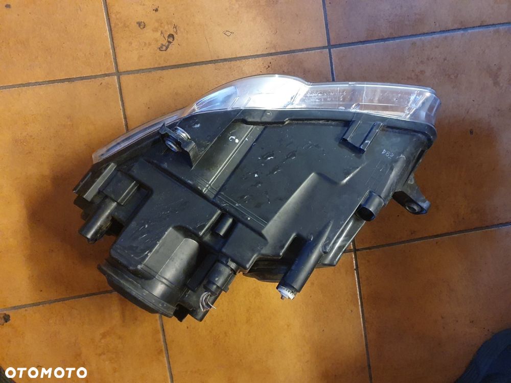 REFLEKTOR PRAWY VW PASSAT B6 HELLA EUROPA - 5