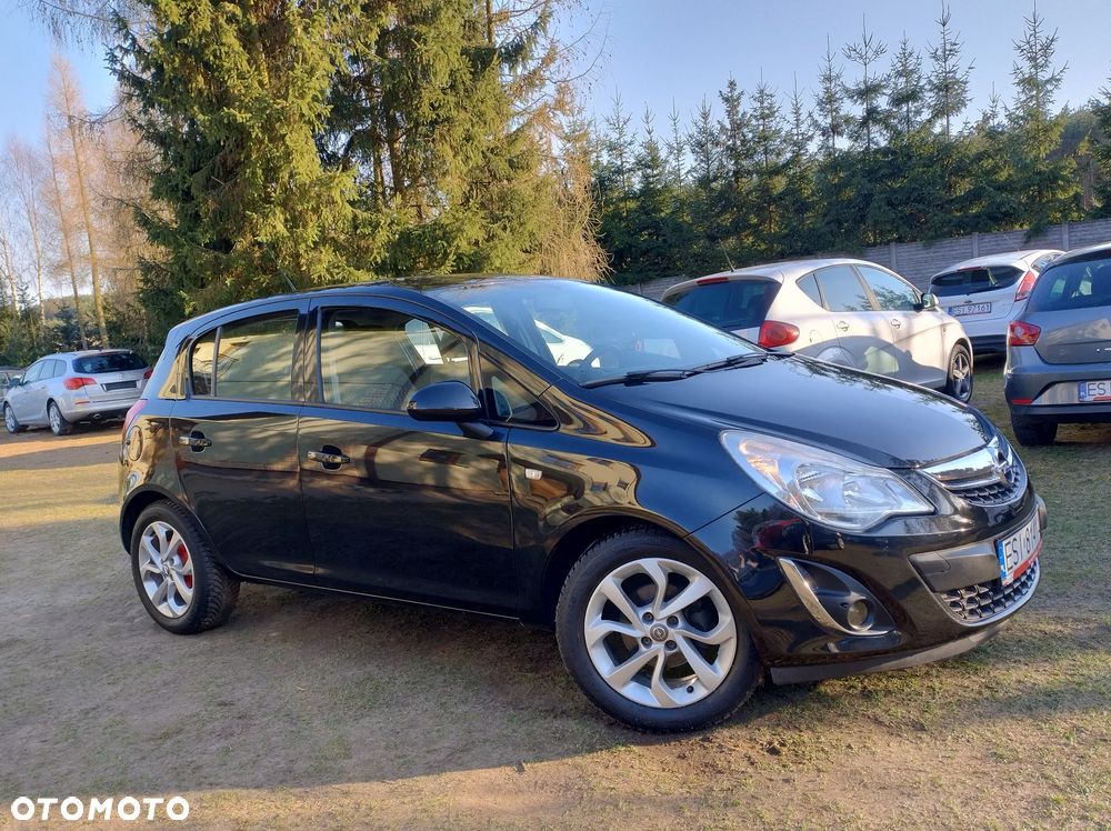 Opel Corsa 1.4 16V Cosmo - 8
