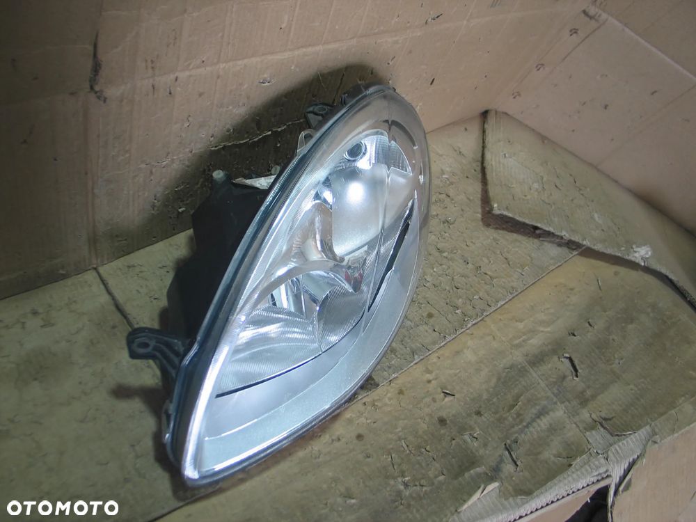 lampa przod lancia ypsilon 2 II lift 06-11r. oryginal europa - 4