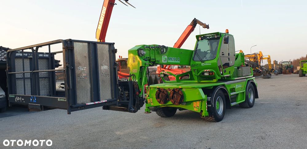 Merlo 60.24MCSS /kosz hydr. rozkładany/pilot/widły/sprowadzona - 19