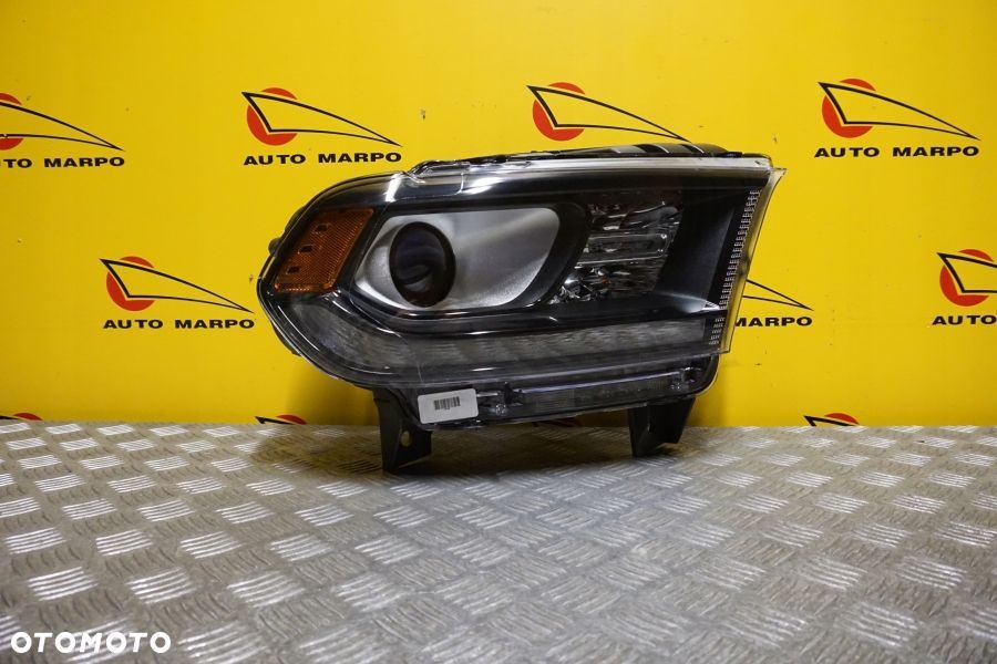 DODGE DURANGO 2014- REFLEKTOR LAMPA PRAWA CIEMNA ZWYKŁA Z LED USA - 2