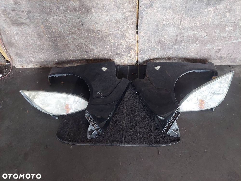 BŁOTNIK LEWY PRAWY PRZÓD + LAMPA LEWY PRAWY PRZÓD MITSUBISHI COLT VI 11H - 1