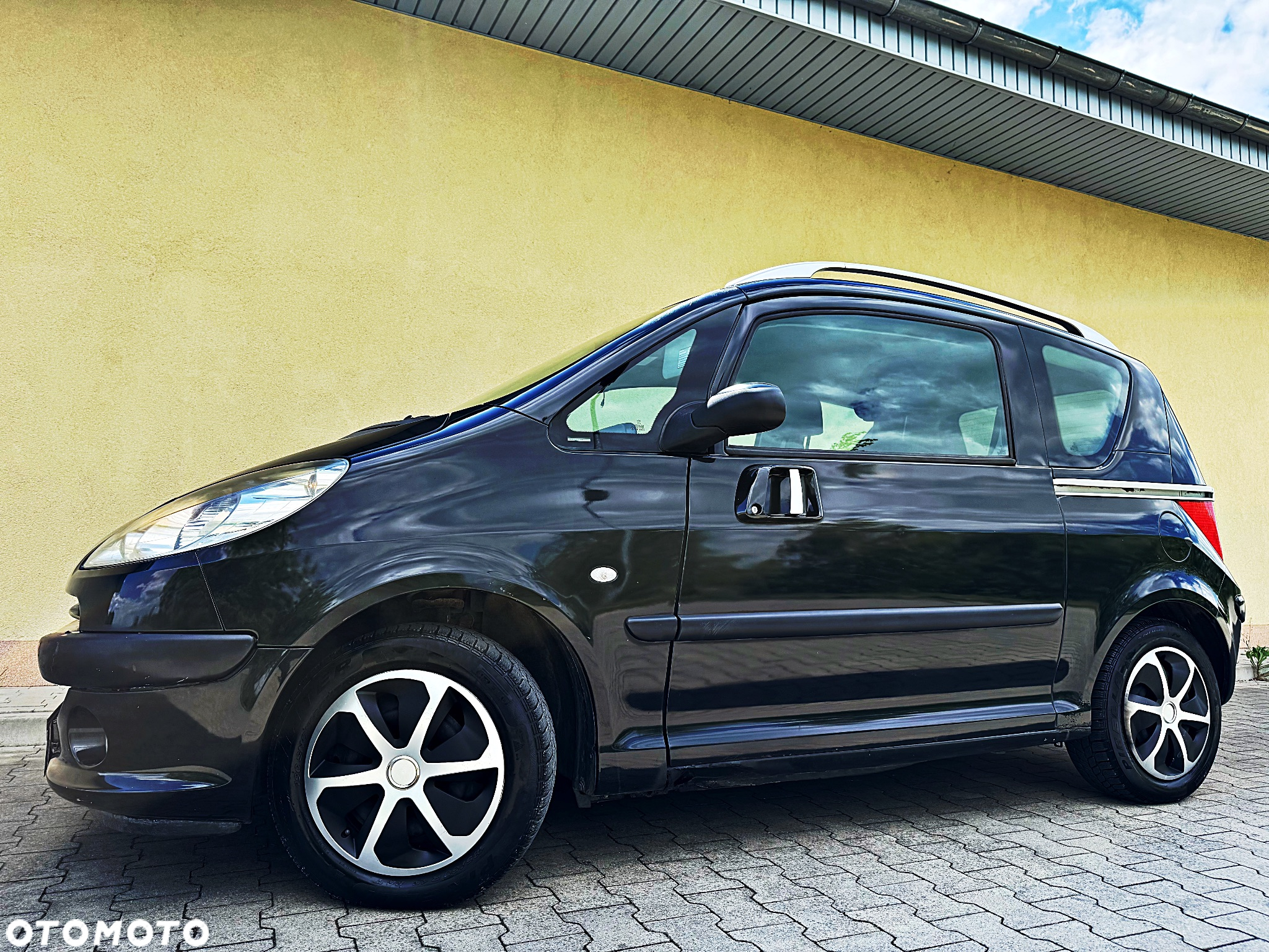 Peugeot 1007 1.4 Trendy - 14